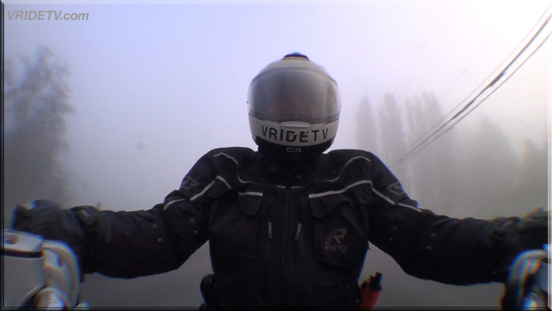 motorcycle rider in fog