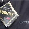 Gore-Tex Pro Shell, "Guaranteed to keep you dry." This means no more packing rain-gear, hoping for an over pass to stop under to put it on : )