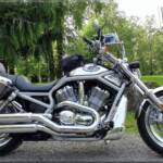 2003 Harley-Davidson Vrod equipped with: HD saddlebags, Avon tyres, Pingle steering stabilizer, PIAA led lights, Superbrace, Ortlieb cmaera bag, more parts still to be installed from Progressive Suspension & Unlimited Engineering.