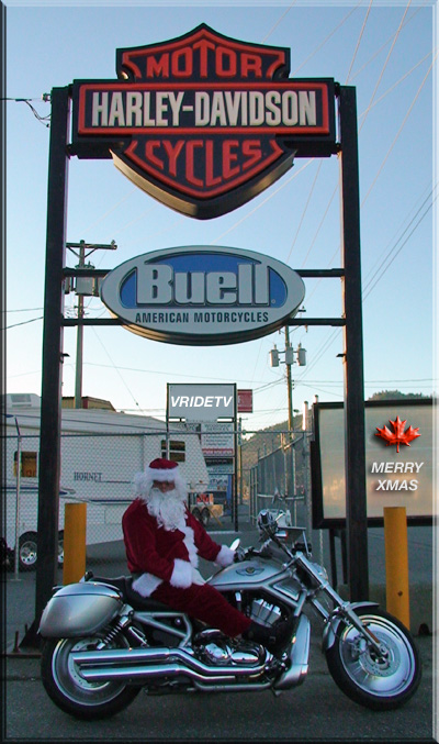 Santa rides a Harley Davidson VROD