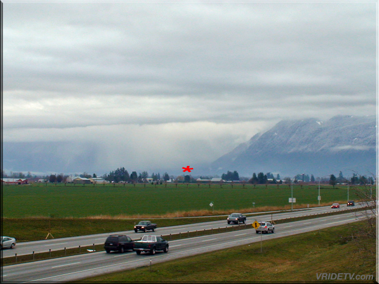 Storm clouds in the Fraser Valley, British Columbia.Prest road on ramp