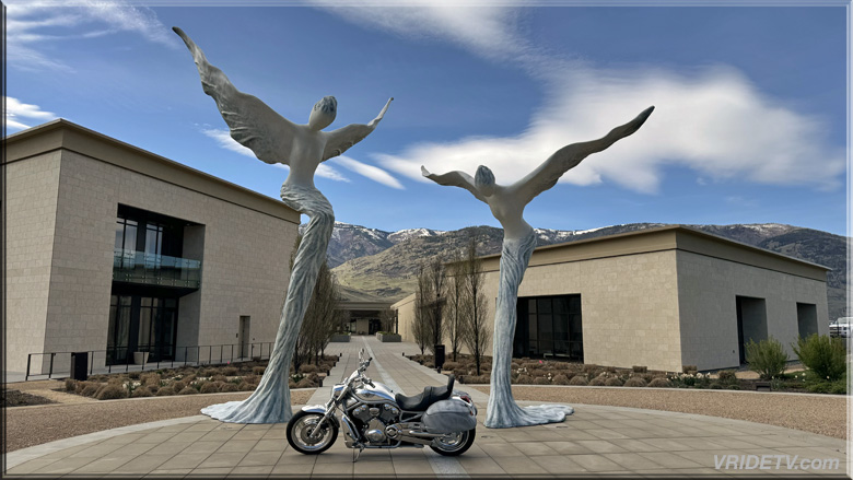 Harley Davidson with statues