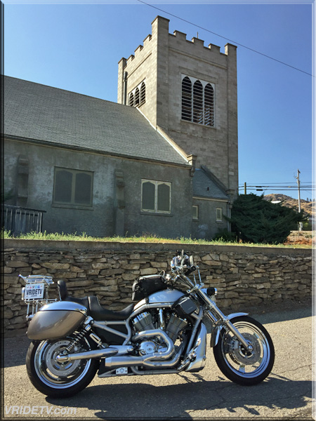Old church and a harley davidson vrod